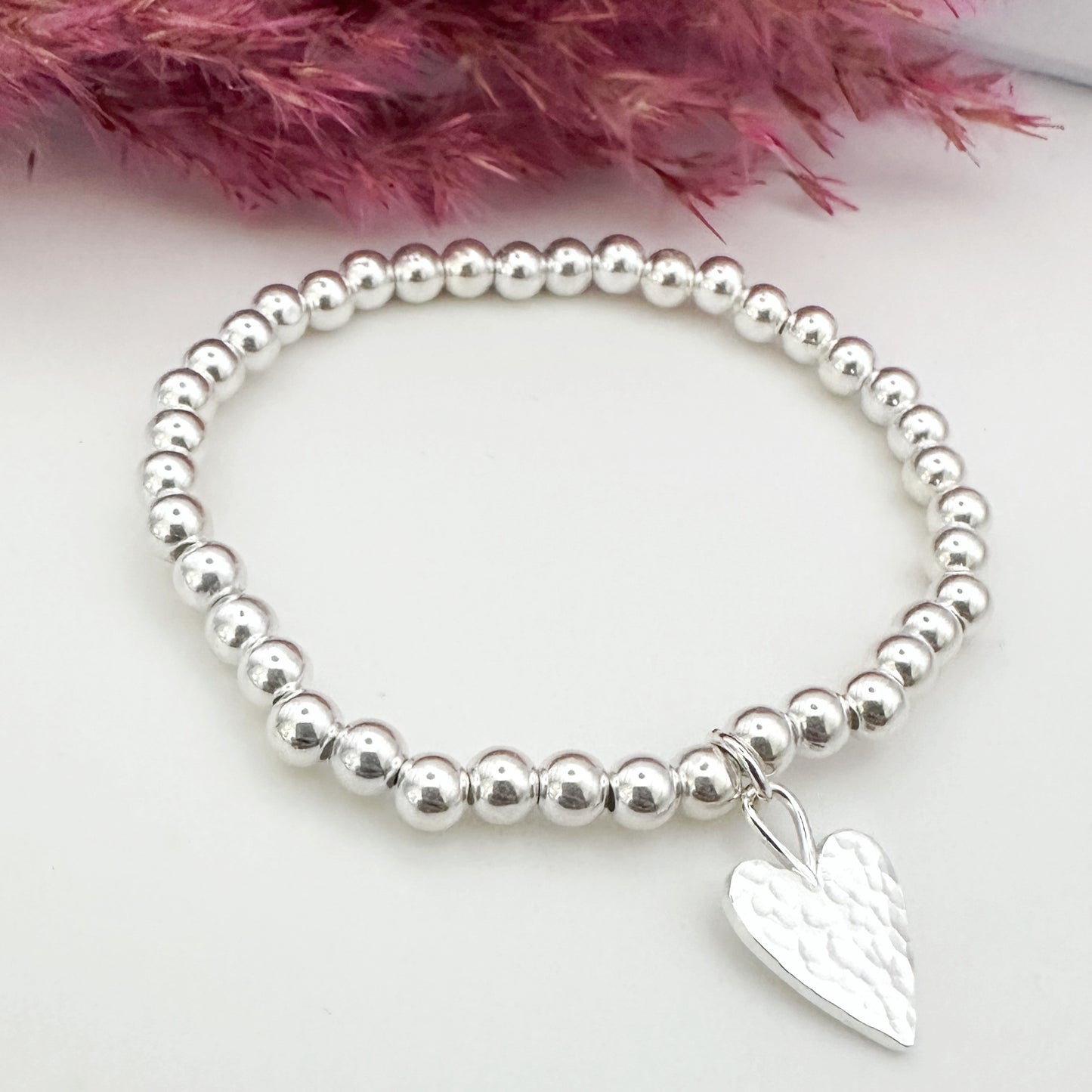 Silver Stretch Bead Bracelet with Hammered Heart Charm