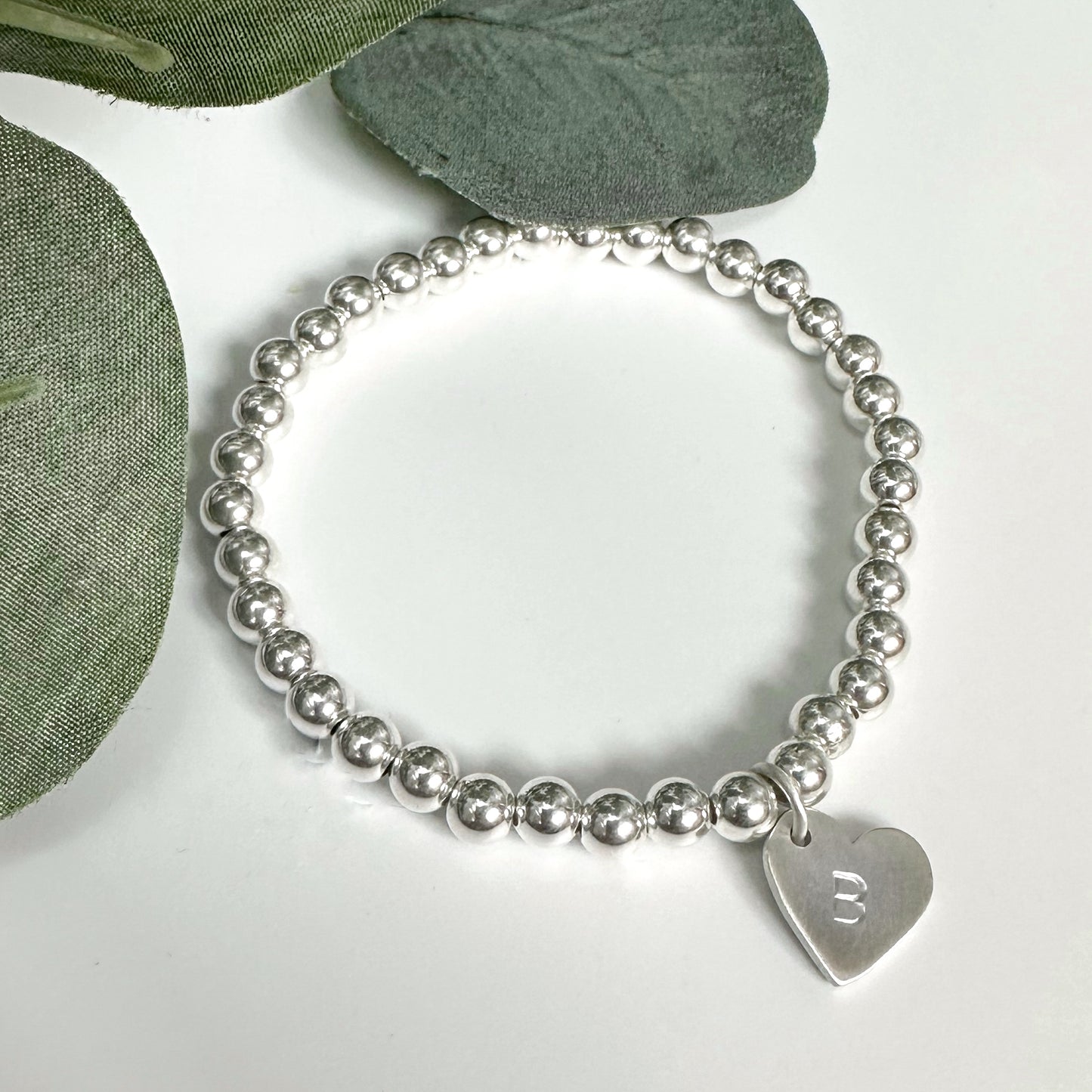 Silver Stretch Bead Bracelet with a Brushed Silver Personalised Heart