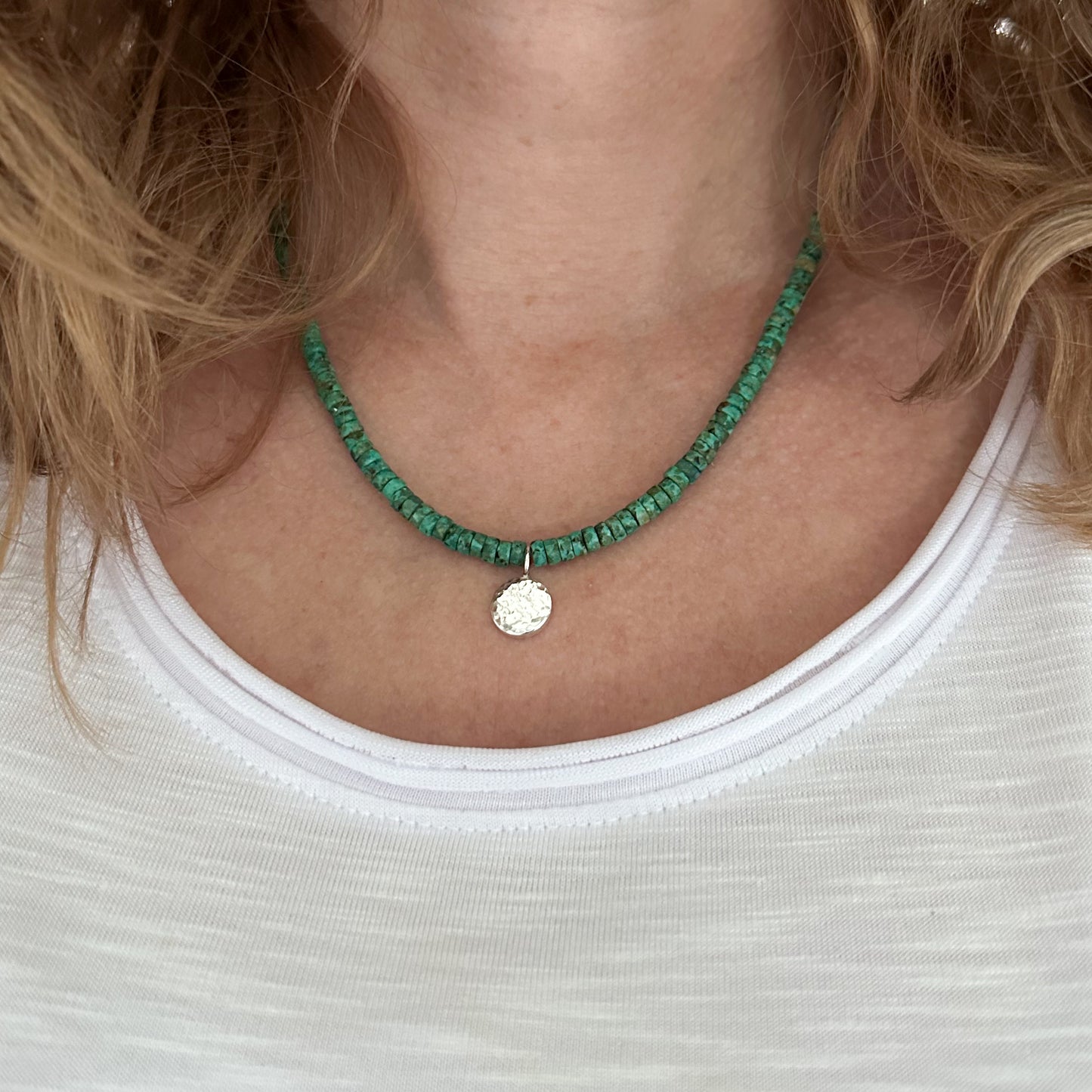 African Turquoise Bead and Hammered Silver Charm Necklace