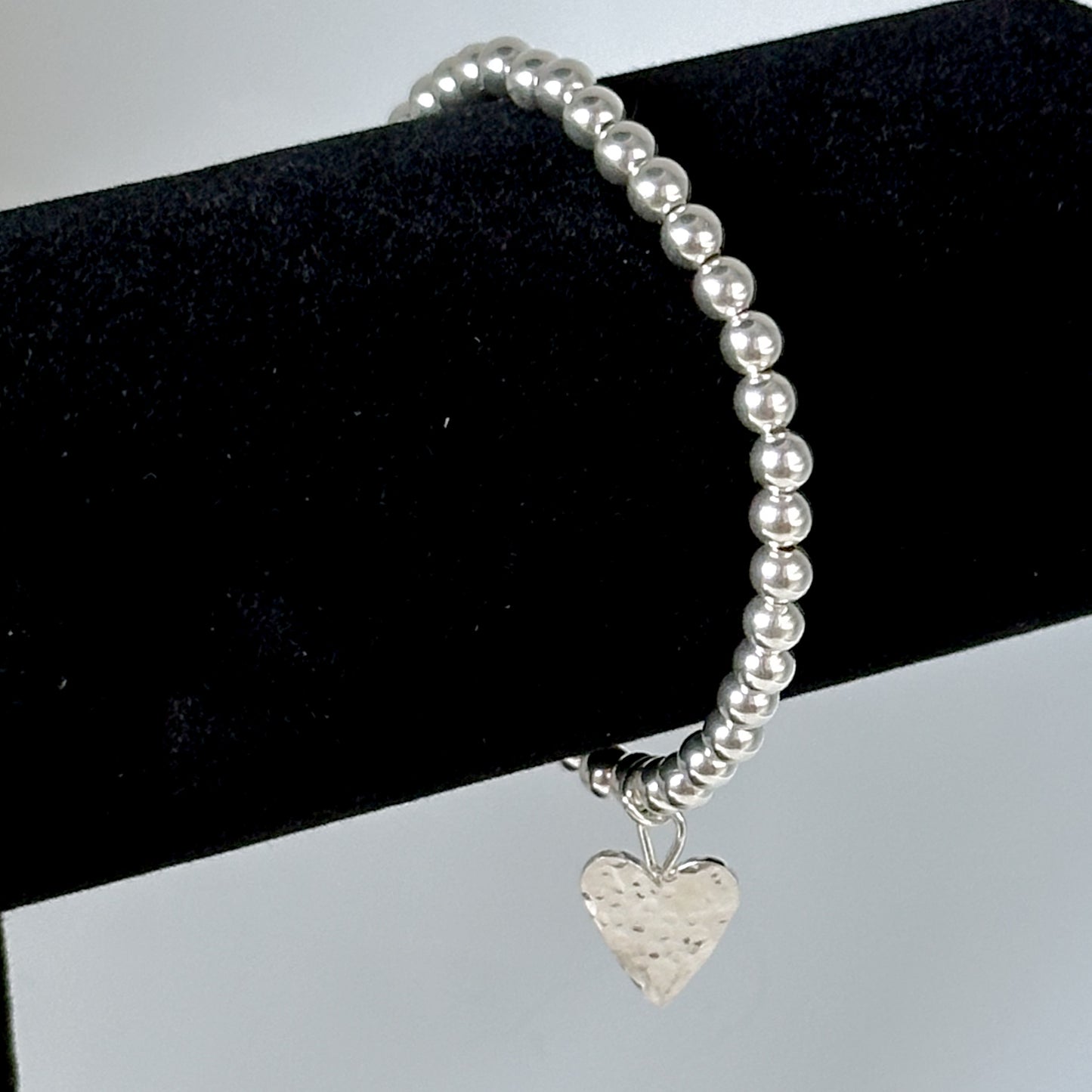 Silver Stretch Bead Bracelet with Hammered Heart Charm