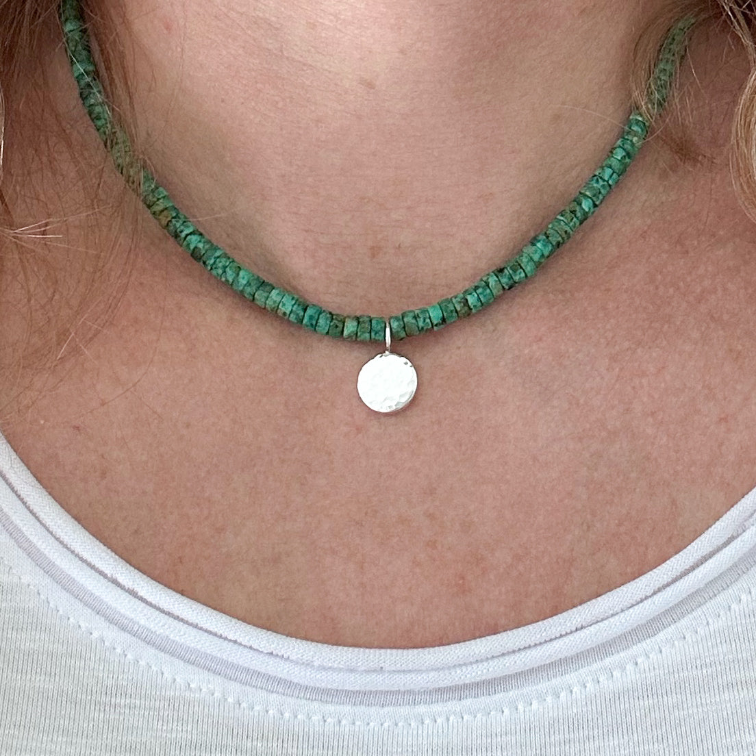 African Turquoise Bead and Hammered Silver Charm Necklace