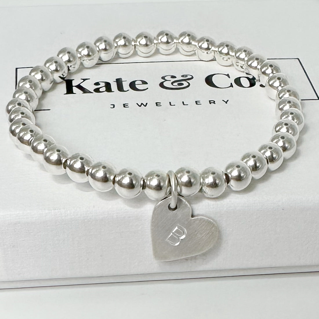 Silver Stretch Bead Bracelet with a Brushed Silver Personalised Heart